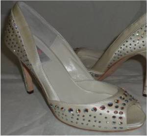 Designer Swarovski crystal covered ivory or white bridal evening shoes with a peeptoe